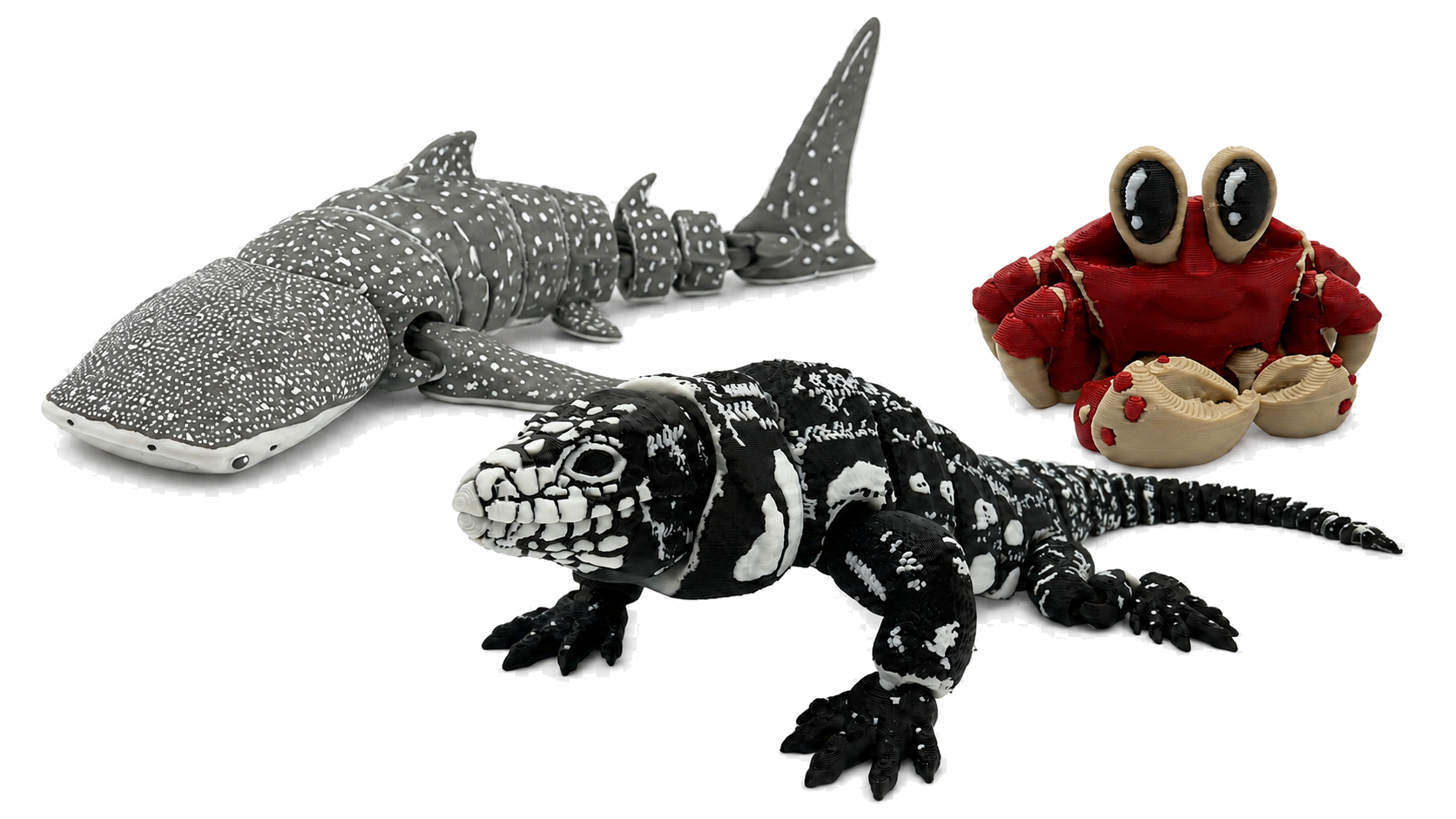 Whale shark, black and white lizard, and red crab printed by Gleason 3D